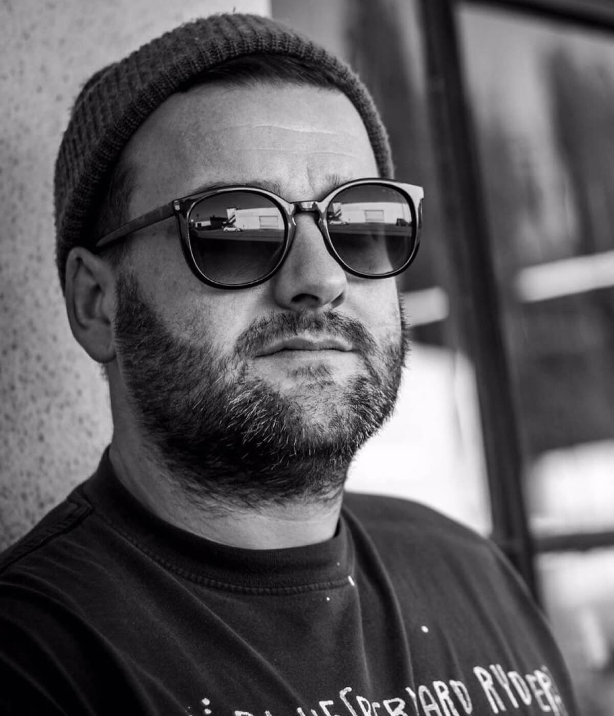 Focused Alister McDermott delivering a powerful fast ball