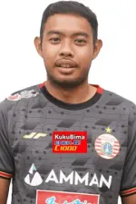 Focused Indonesian goalkeeper with calm expression
