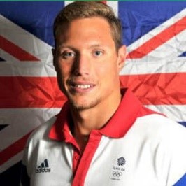 Grant Turner swimming freestyle in competition