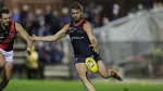 Brad McKenzie in Norwood Football Club jersey, smiling