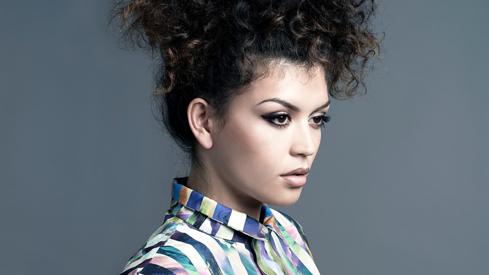 Karen Harding performing live on stage in England