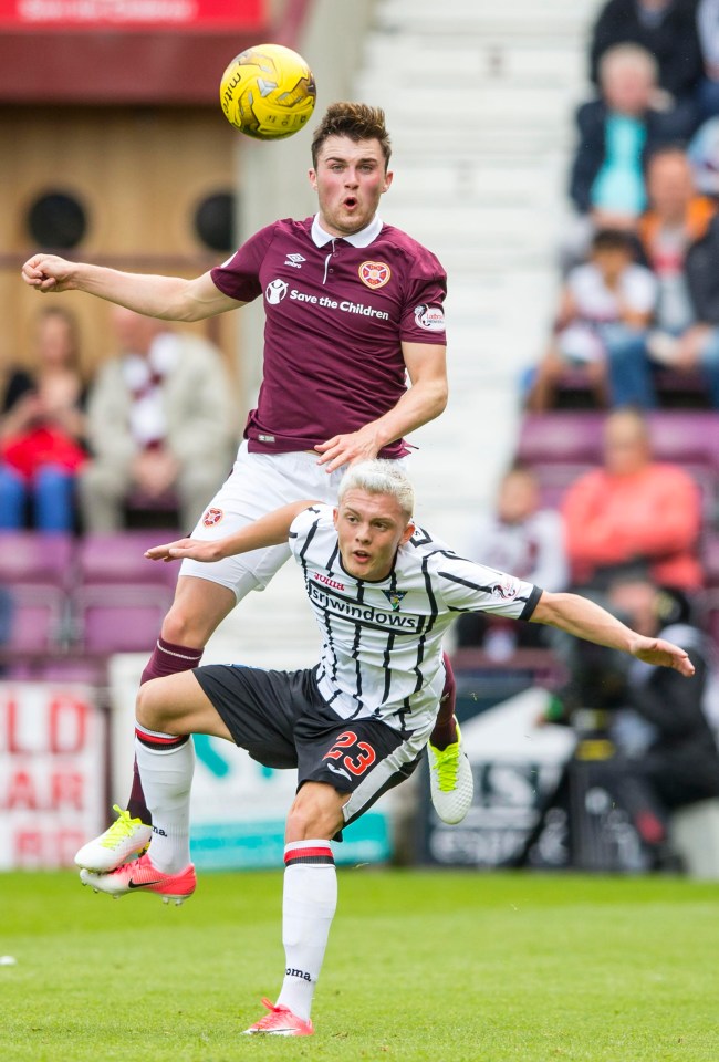 Callum Smith celebrating a decisive goal with fierce determination