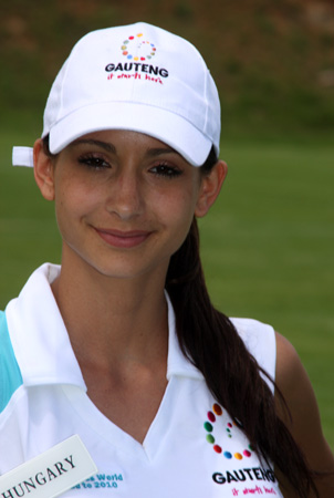 Szilvia Freire at a beauty pageant, radiating elegance and poise.