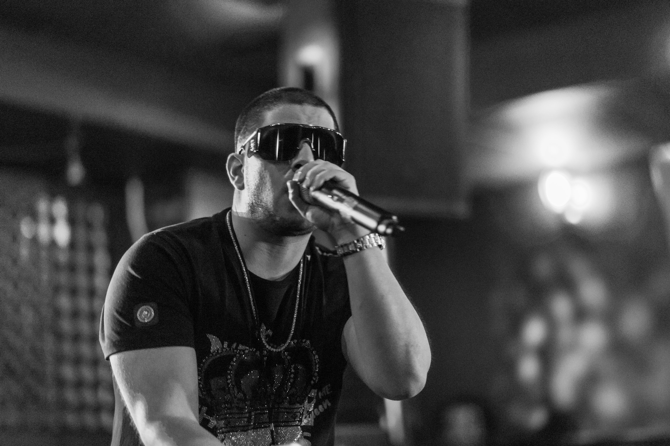 Famoe performing on stage during a concert