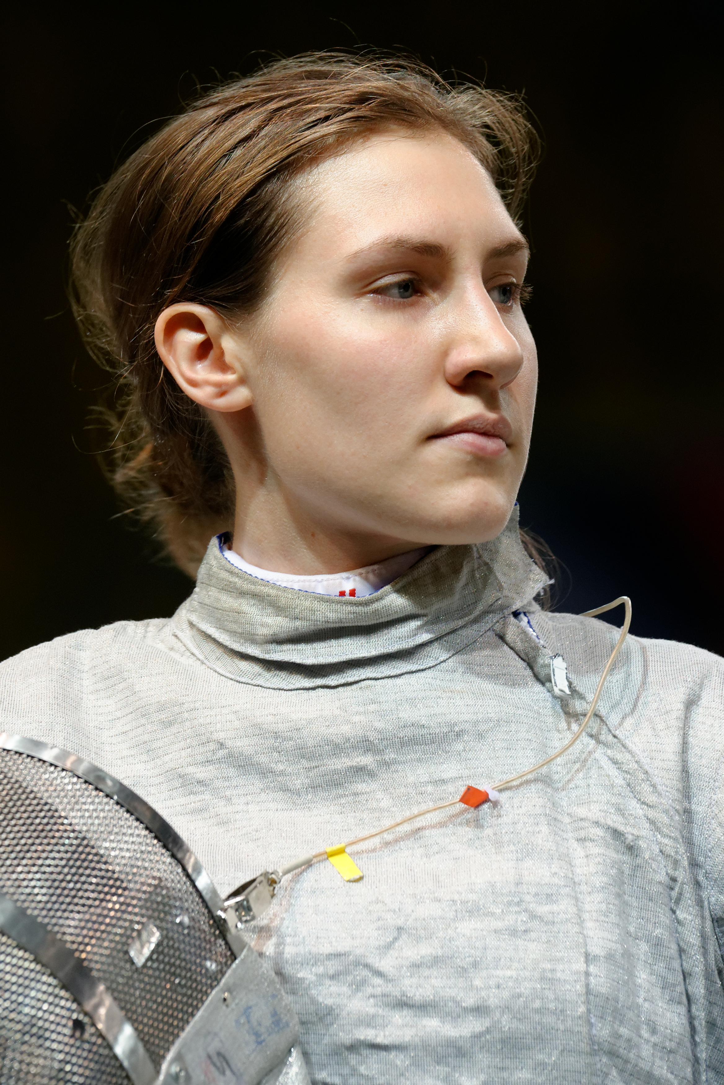 Matylda Ostojska fencing action during a competition