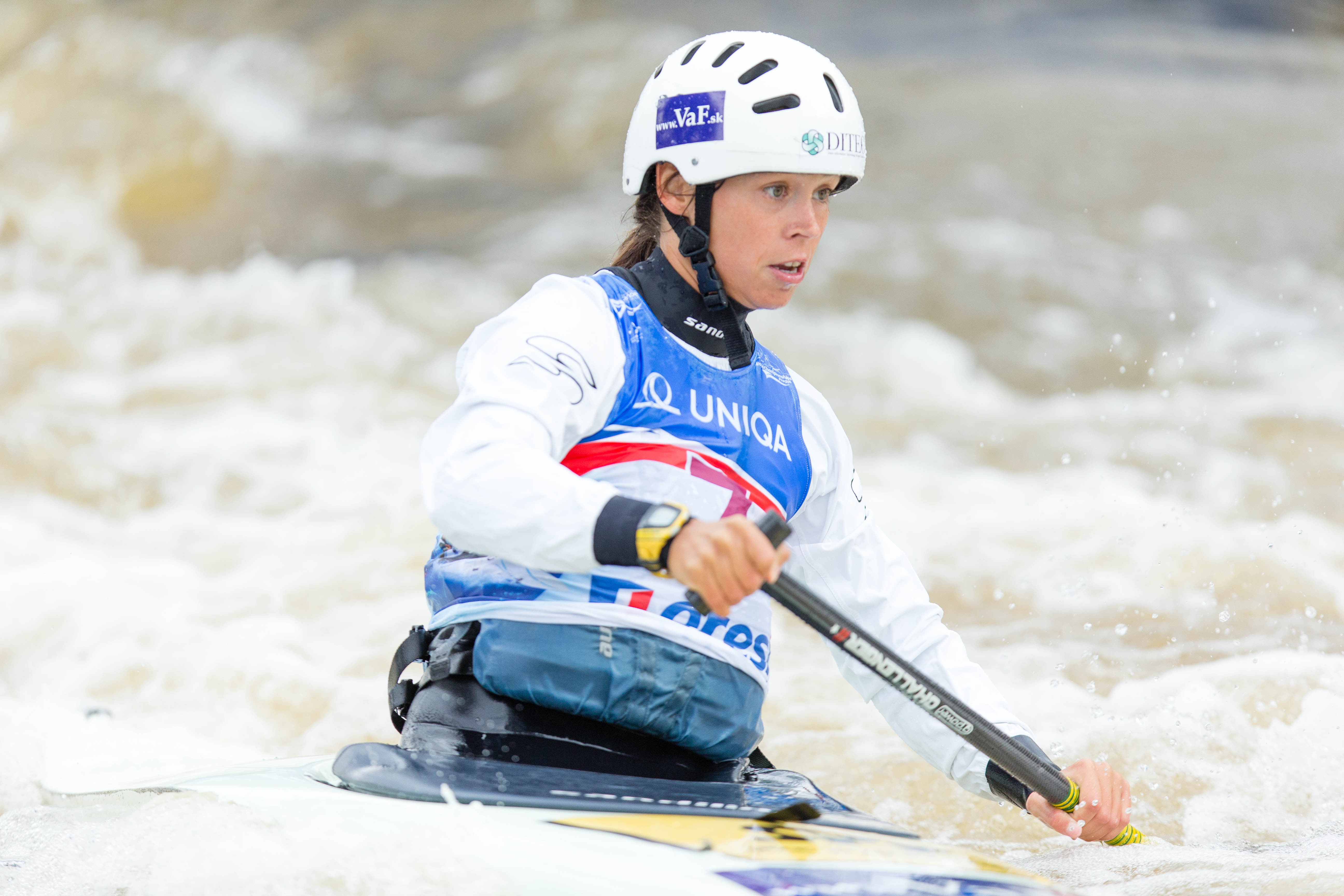 Katarína Macová competing in canoe slalom C1 event