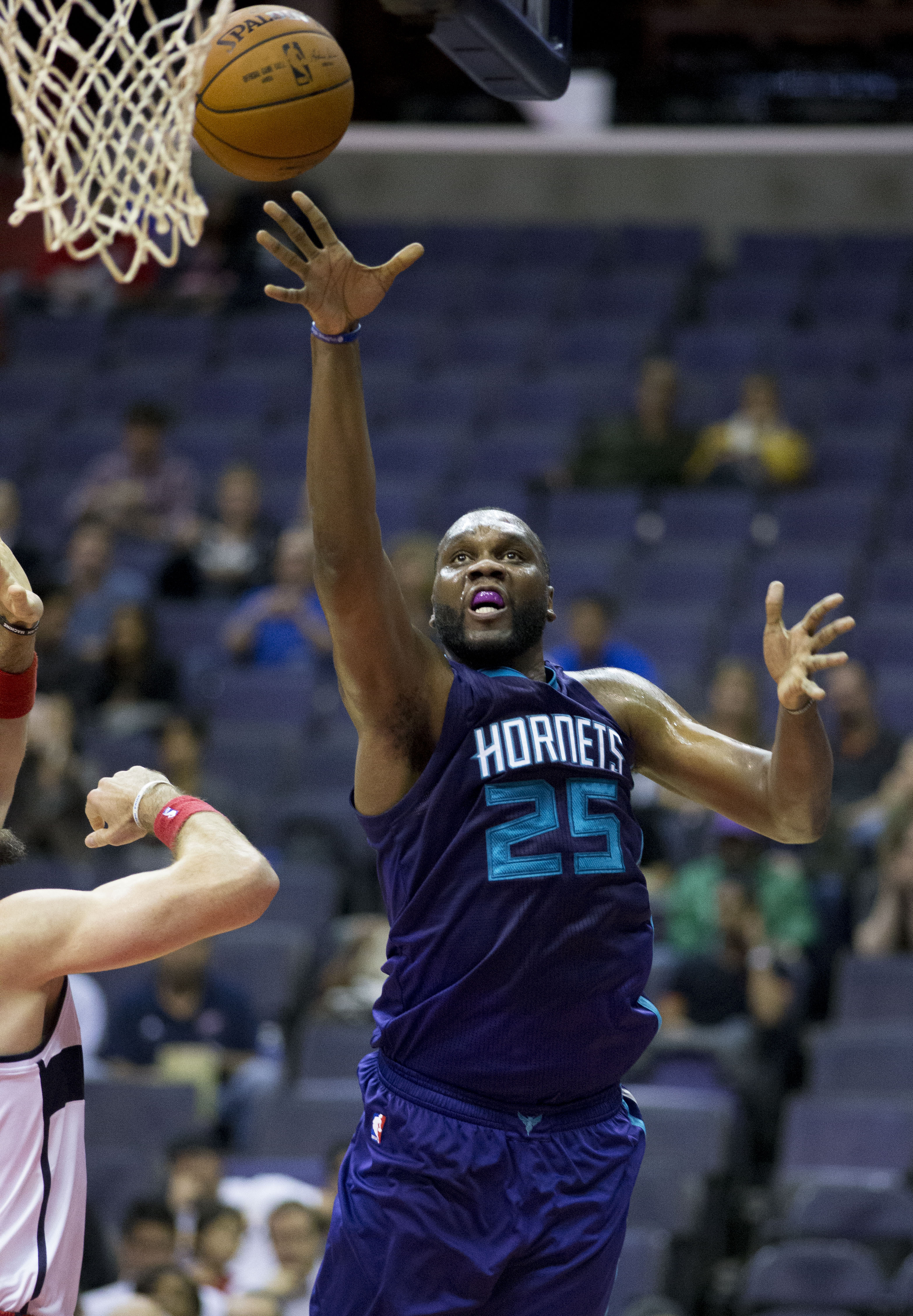 Al Jefferson playing basketball in the NBA