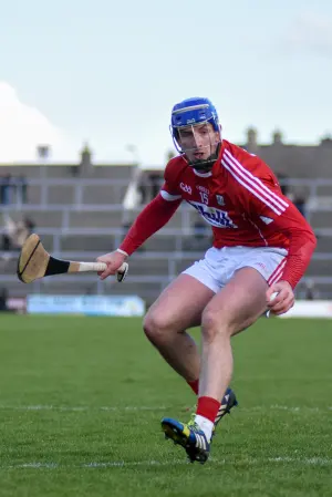 Patrick Horgan striking sliotar in Cork colours