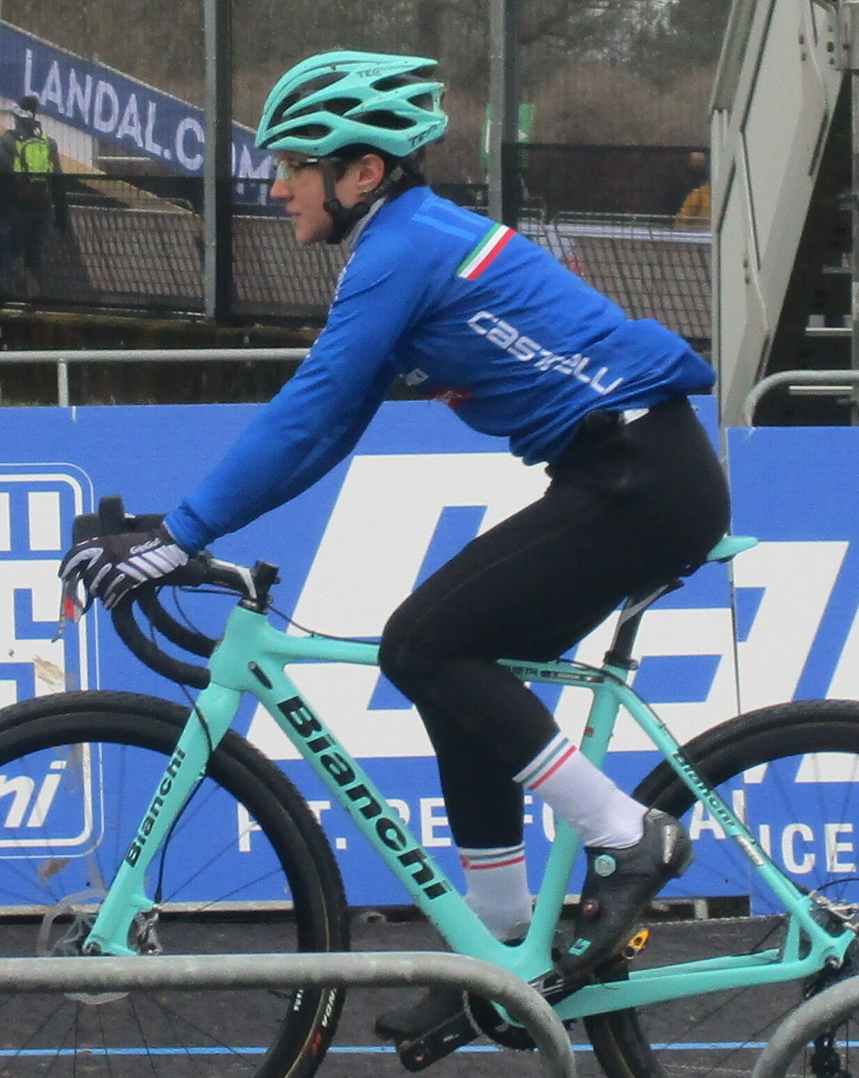 Chiara Teocchi racing mountain bike in Italian national colors