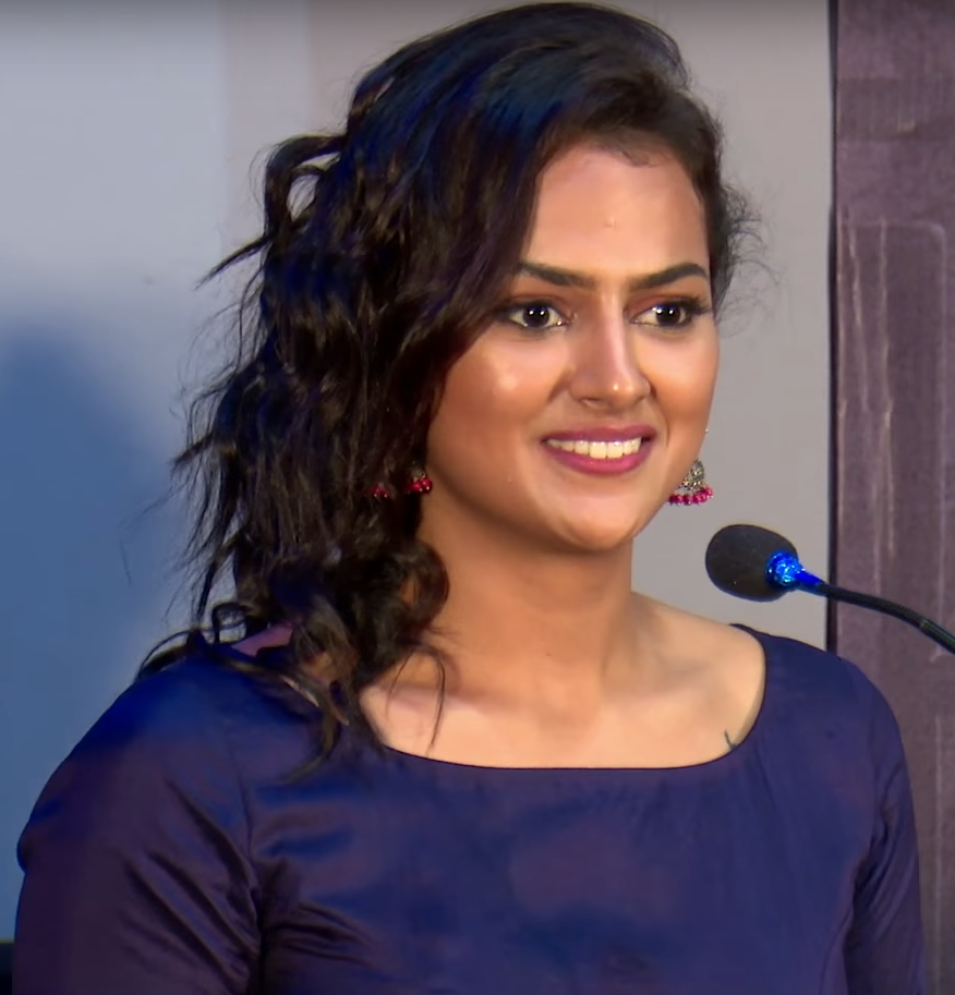Shraddha Srinath smiling at film event in India