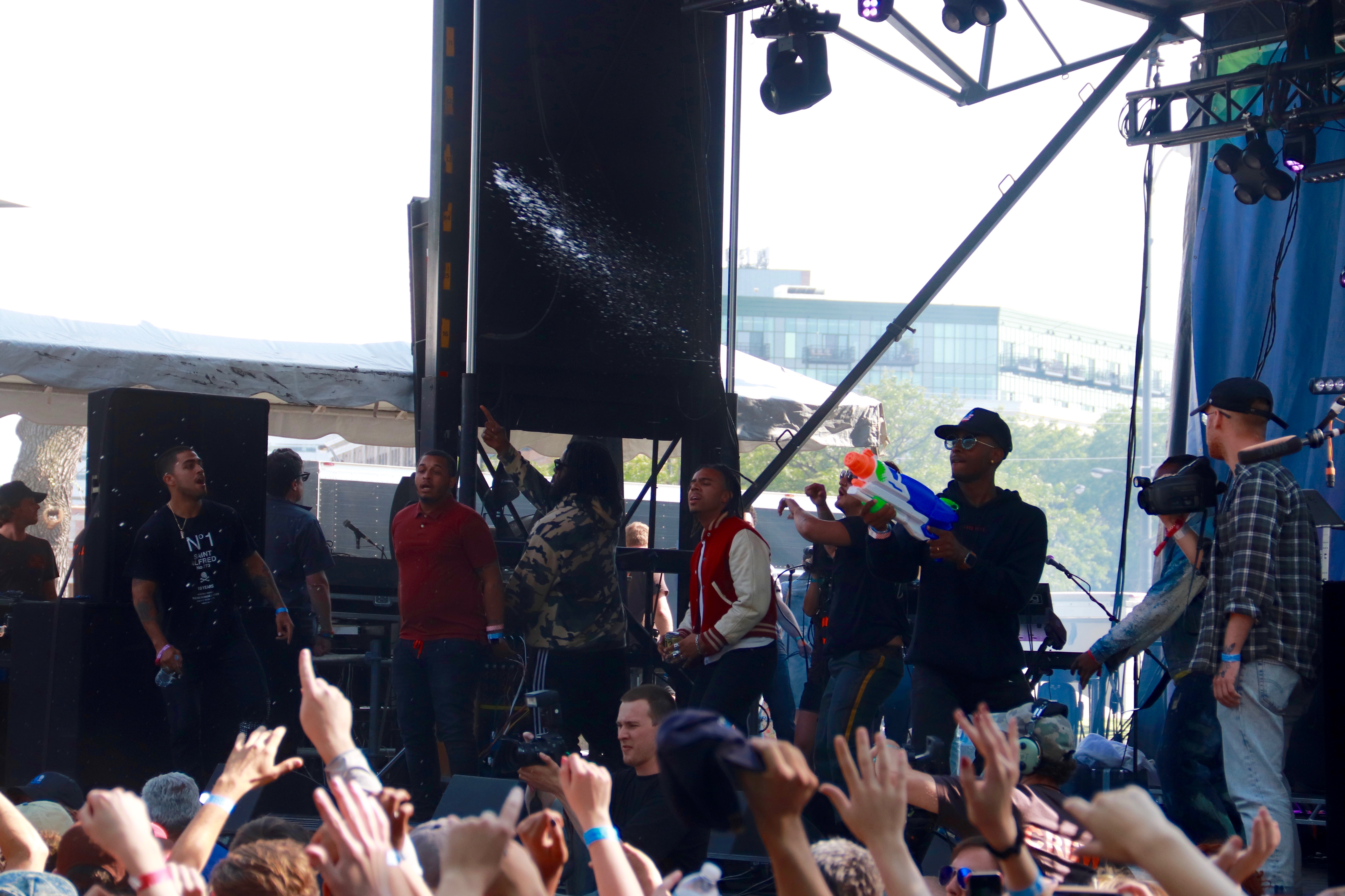Joey Purp performing on stage with vibrant energy.