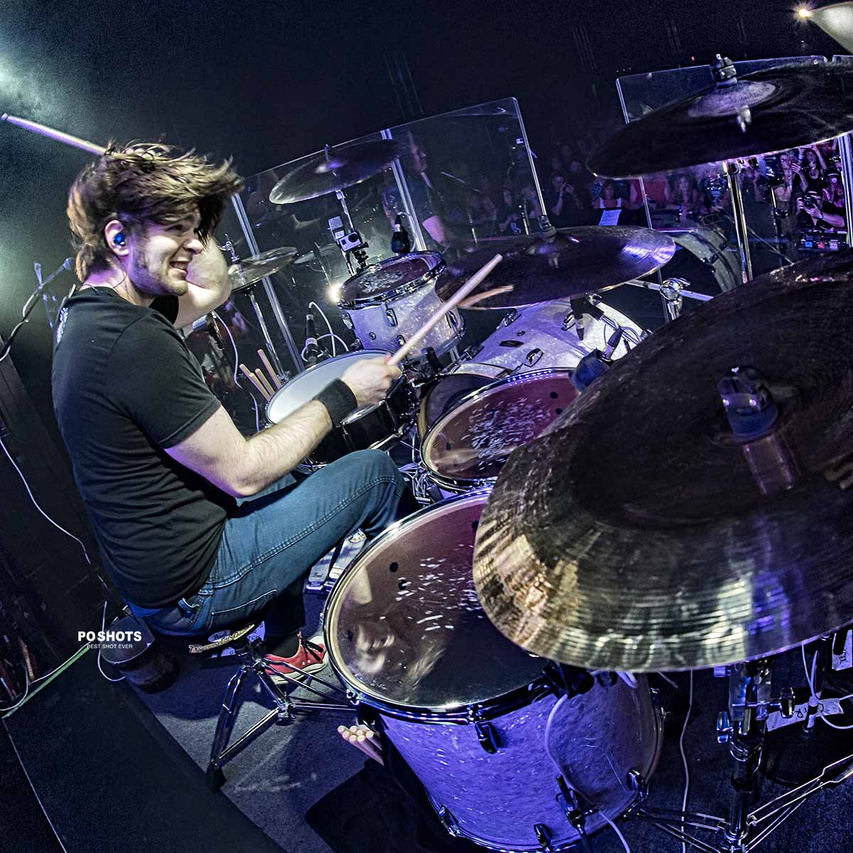 Jason Hartless performing on major rock tour